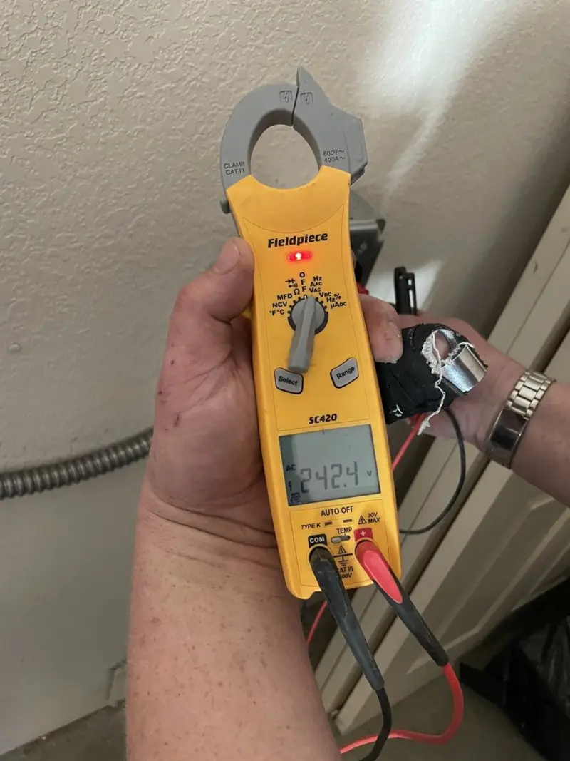 Voltage testing with clamp meter during Circuit Breaker Repair in Brandywine